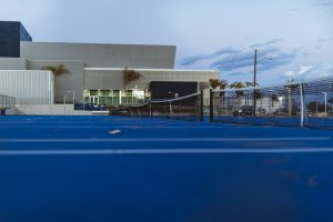 How much does it cost to build a private tennis court?