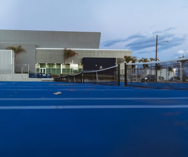 How much does it cost to build a private tennis court?